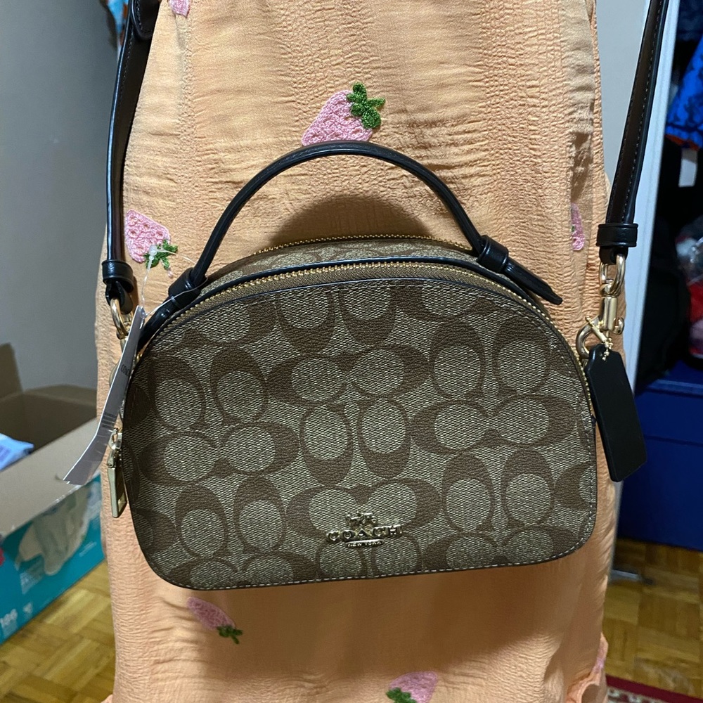 Coach sling bag new with tag